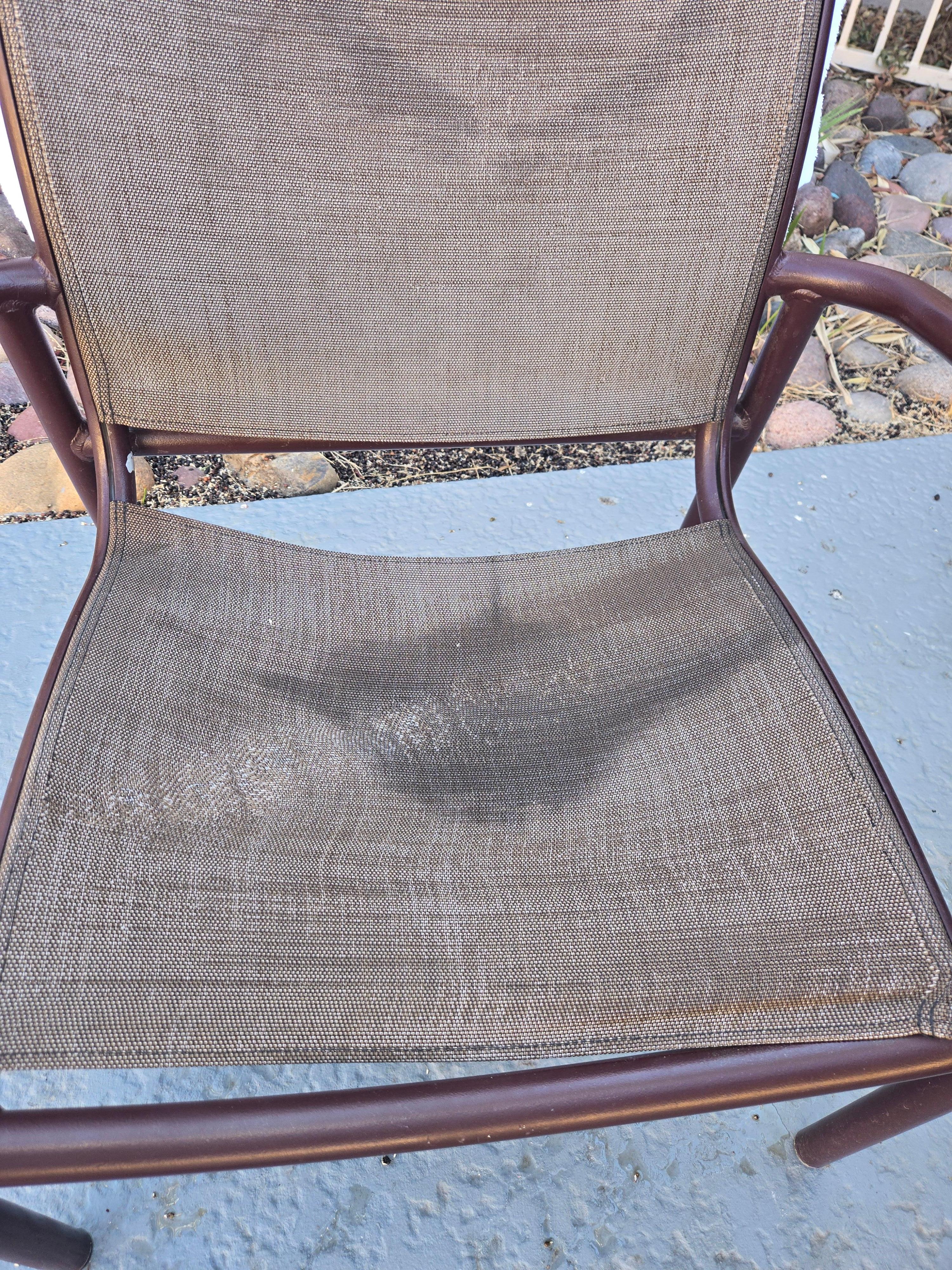 The only non-metal chair at the pool