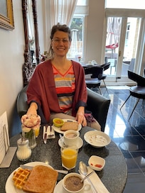 Cereal, bread, croissants, juice and coffee.