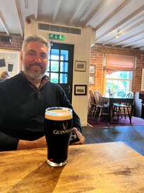 Enjoying a pint after a long travel day!