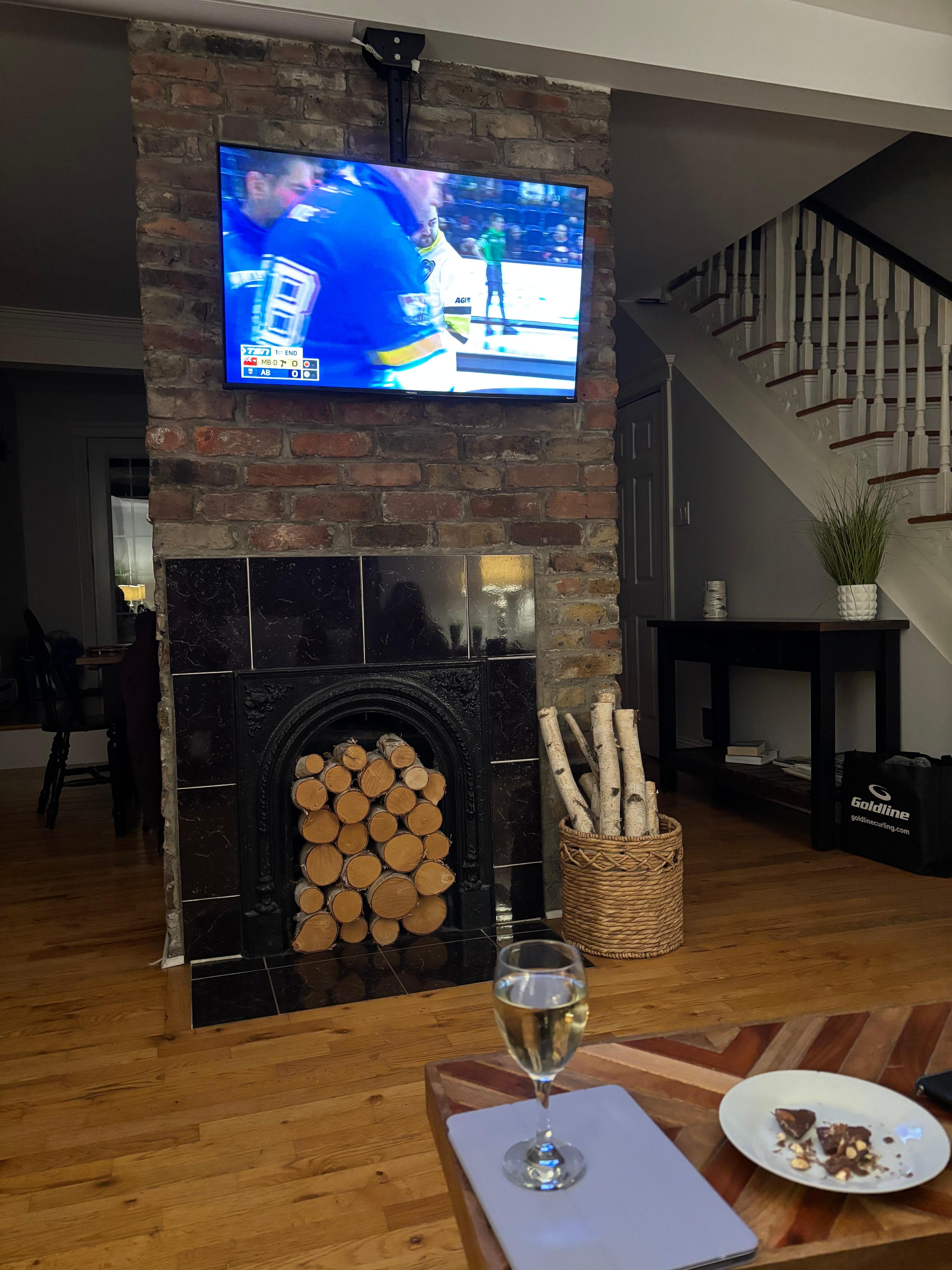 This is the front part of the open downstairs. This is the living room, with the dining room and kitchen behind the old fireplace. 