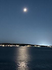 Moon reflected off the Bay