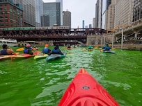 Chicago River paddle weekend before St. Patrick's Day.