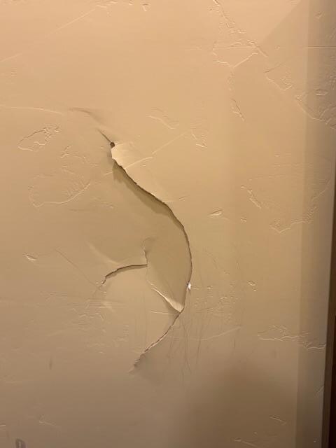 Hole in bedroom wall