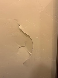 Hole in bedroom wall