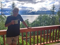 Great Grandad enjoying his morning tea on the deck.