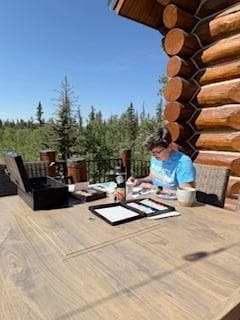 Working on some art work on the east facing deck.