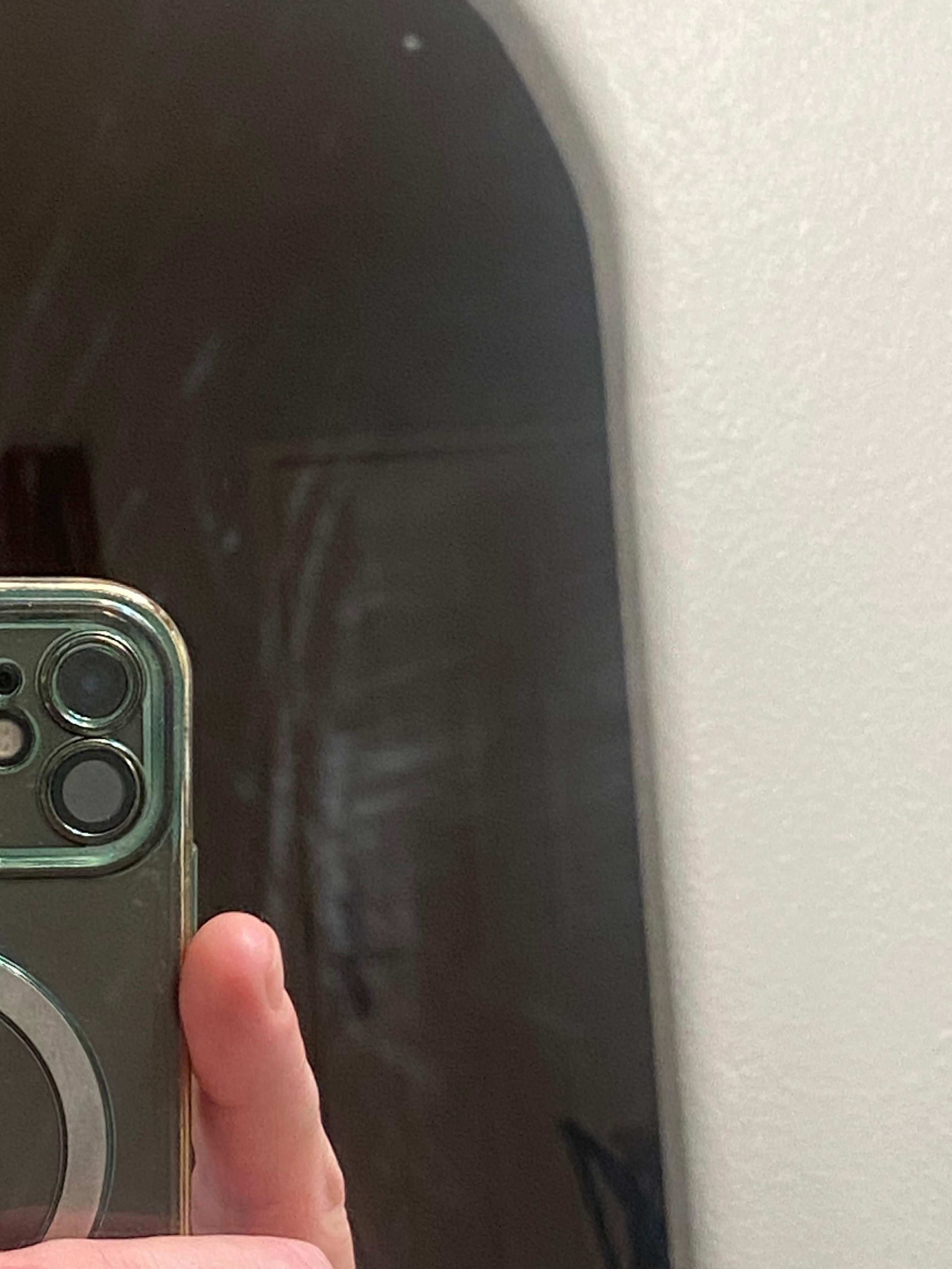 Mirror was filthy I cleaned it so I could see better