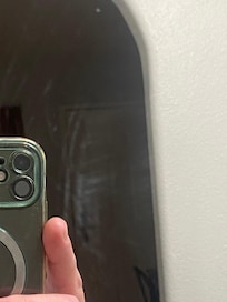 Mirror was filthy I cleaned it so I could see better