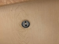 Round fixture for toilet paper holder