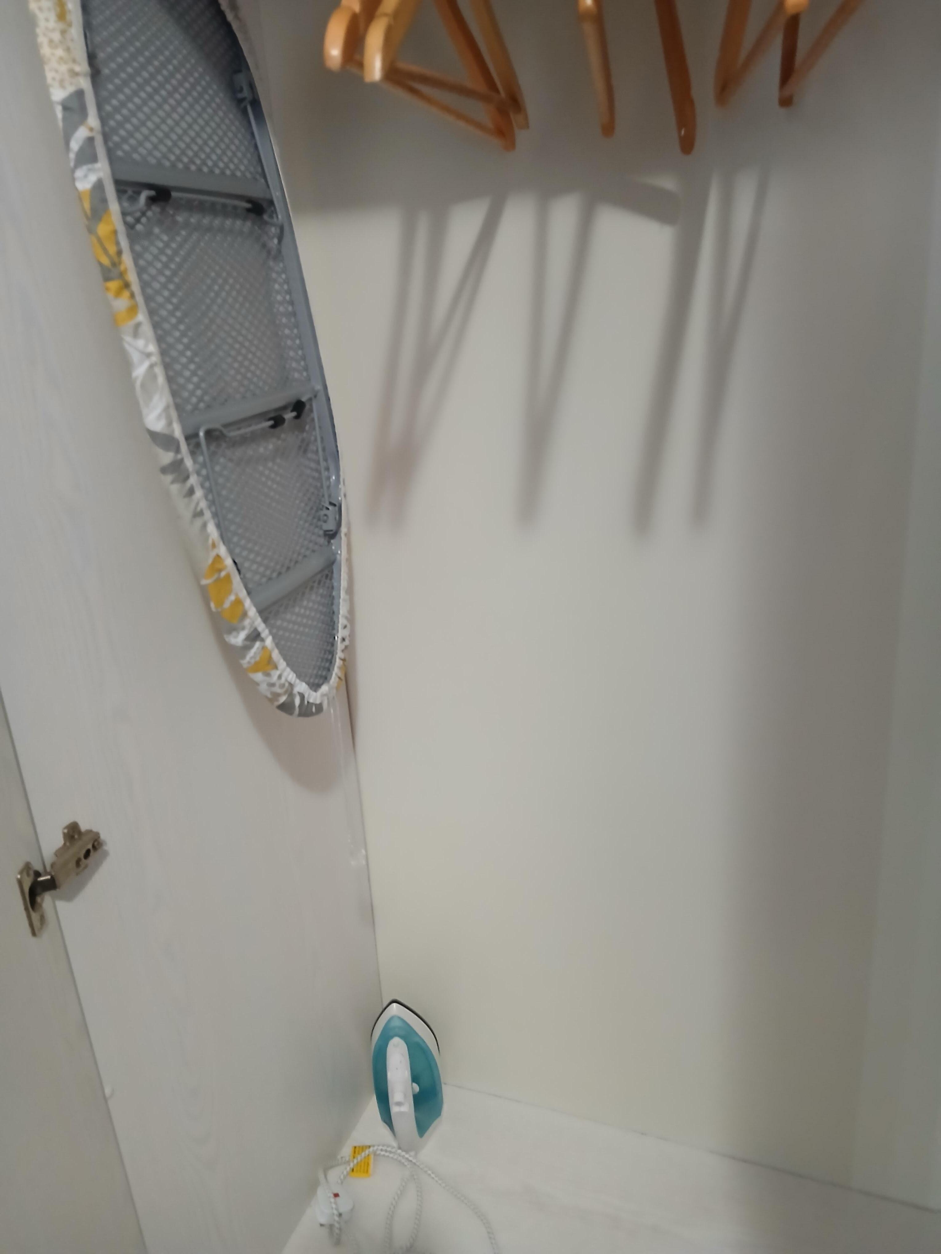 Iron and Board provided.