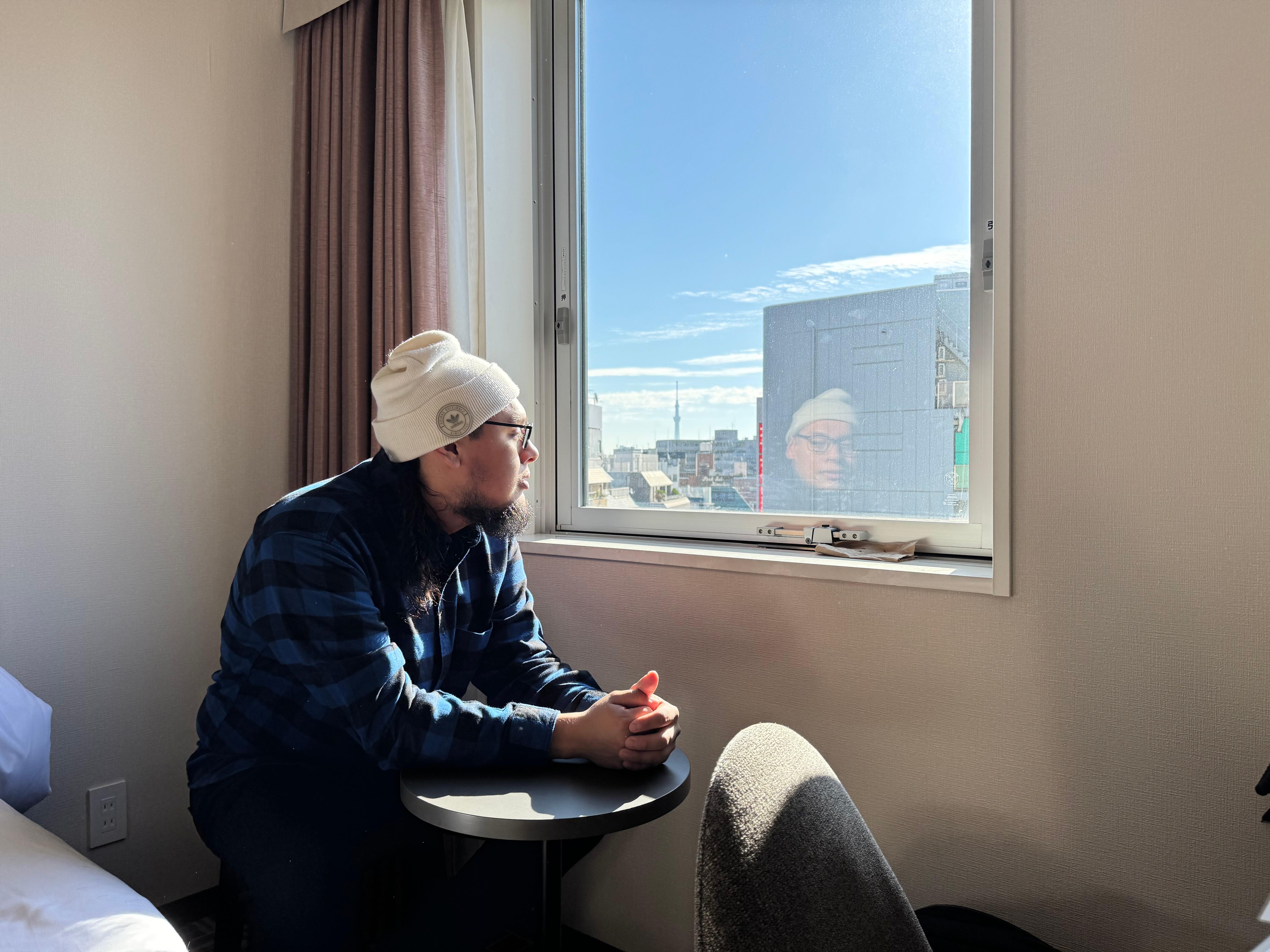 Photo of me looking to the city from my room