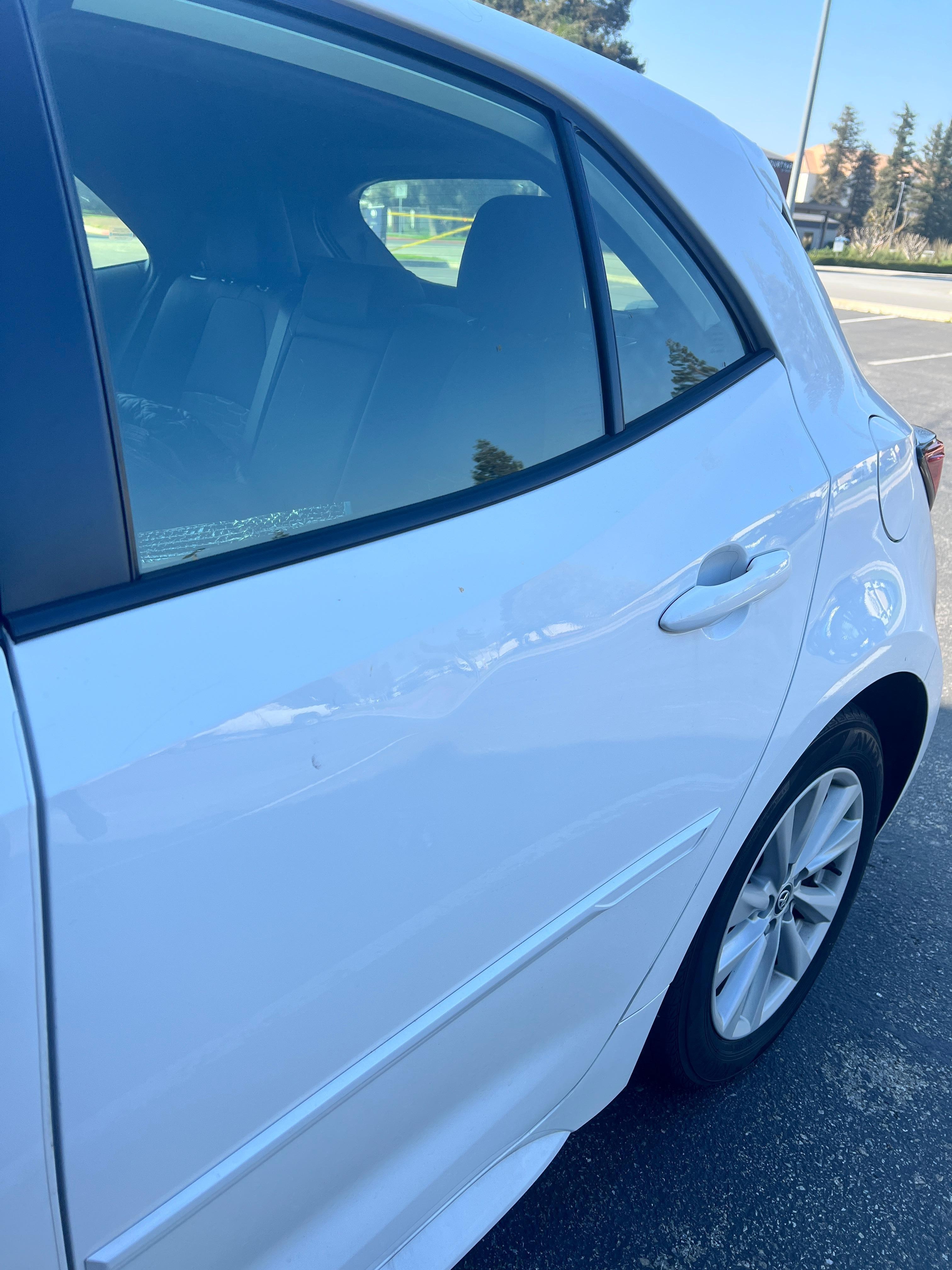 There's a dent, probably from someone leaning on my car.