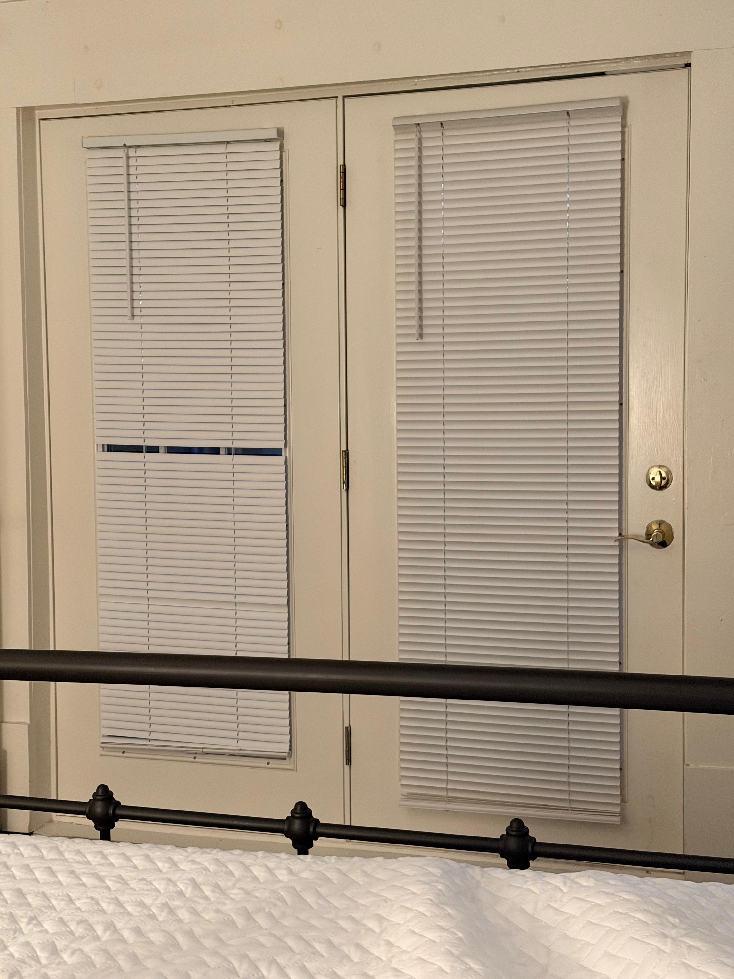 Broken blinds in main bedroom