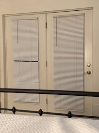 Broken blinds in main bedroom