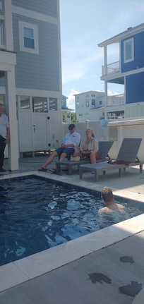 Fun in the pool at beach house!