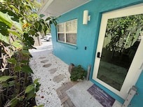 This is an end unit with dedicated off-street parking.