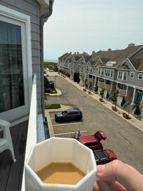 coffee in the morning on the balcony with the ocean in the distance