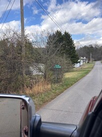 The tiny sign we missed headed down the street