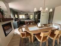 Adorable farmhouse kitchen and dining room with remote-control fireplace!