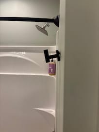 Towel hook separated from wall-master bathroom