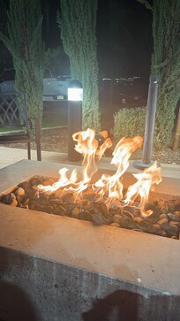 Fire pit by the pool area. Nice vibe and place to chill at night