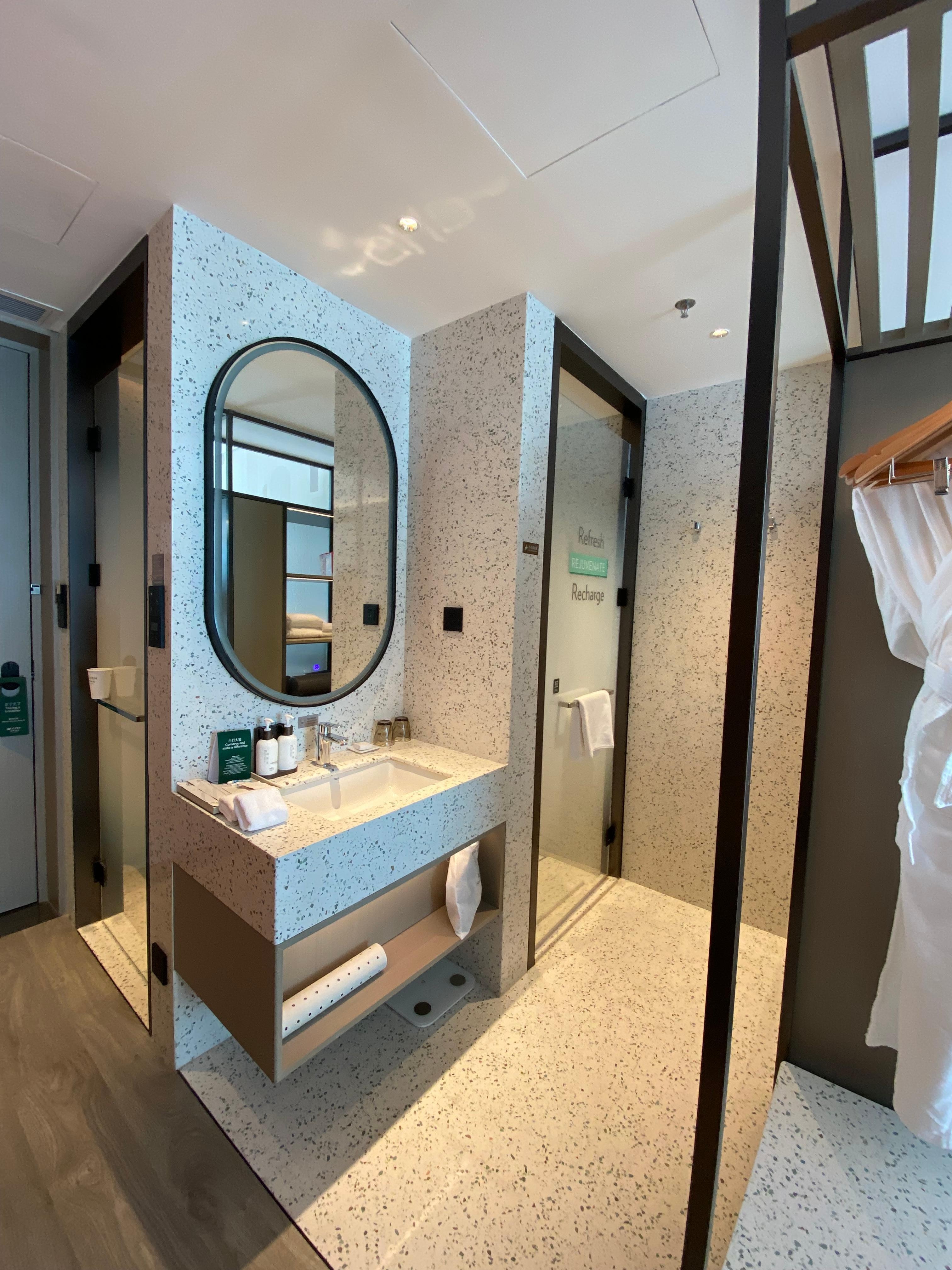 No enclosed space for changing before entering the shower cubicle.