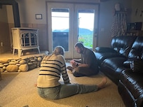Playing cards with a deck that was at the house
