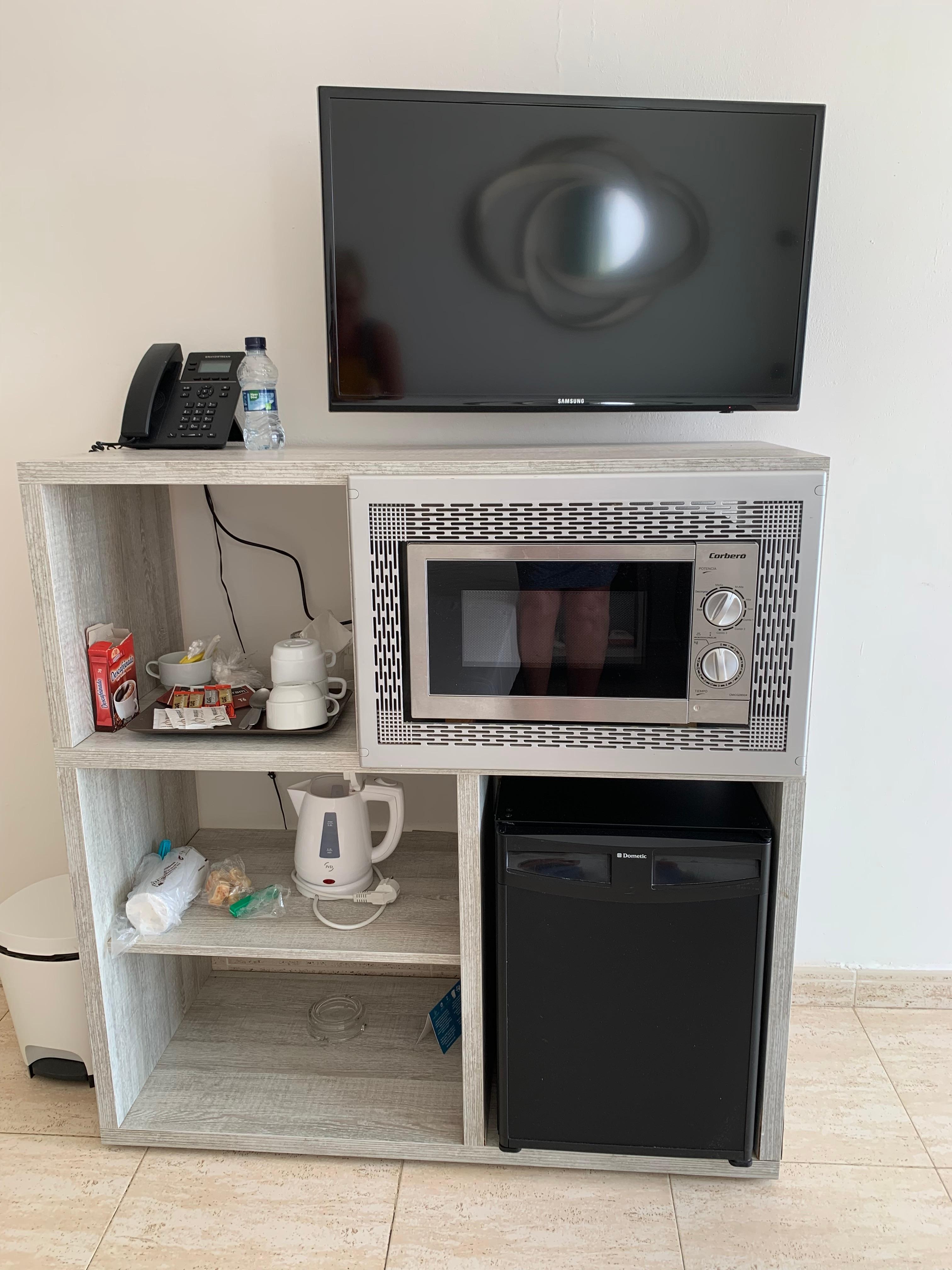 Facilities in the main living area/ bedroom.Tv had some English channels and YouTube.