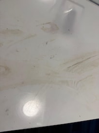 Makeup and grime on the bathroom desk