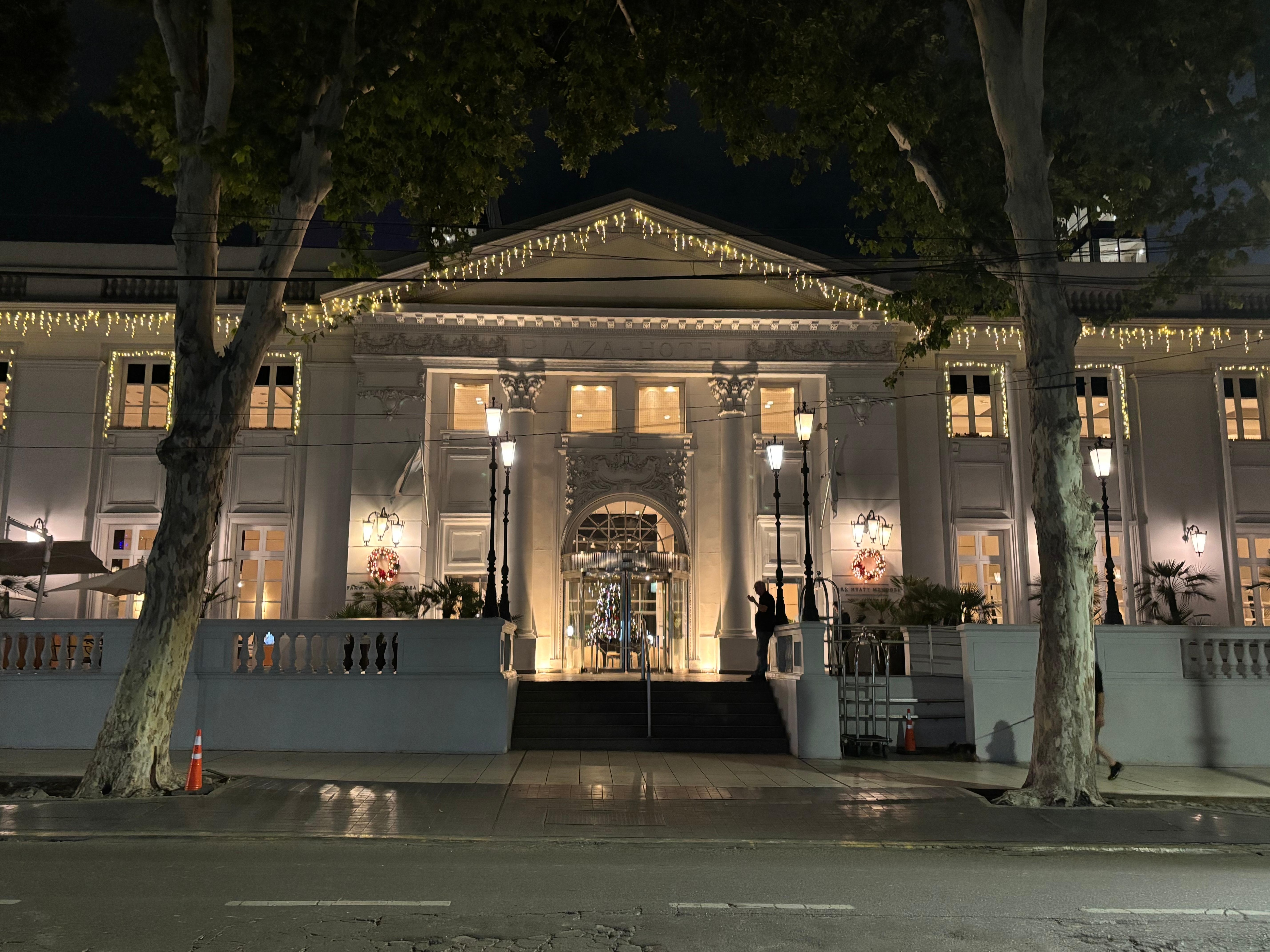 Front of building at night. The historic facade is the only thing old. Inside is all modern.