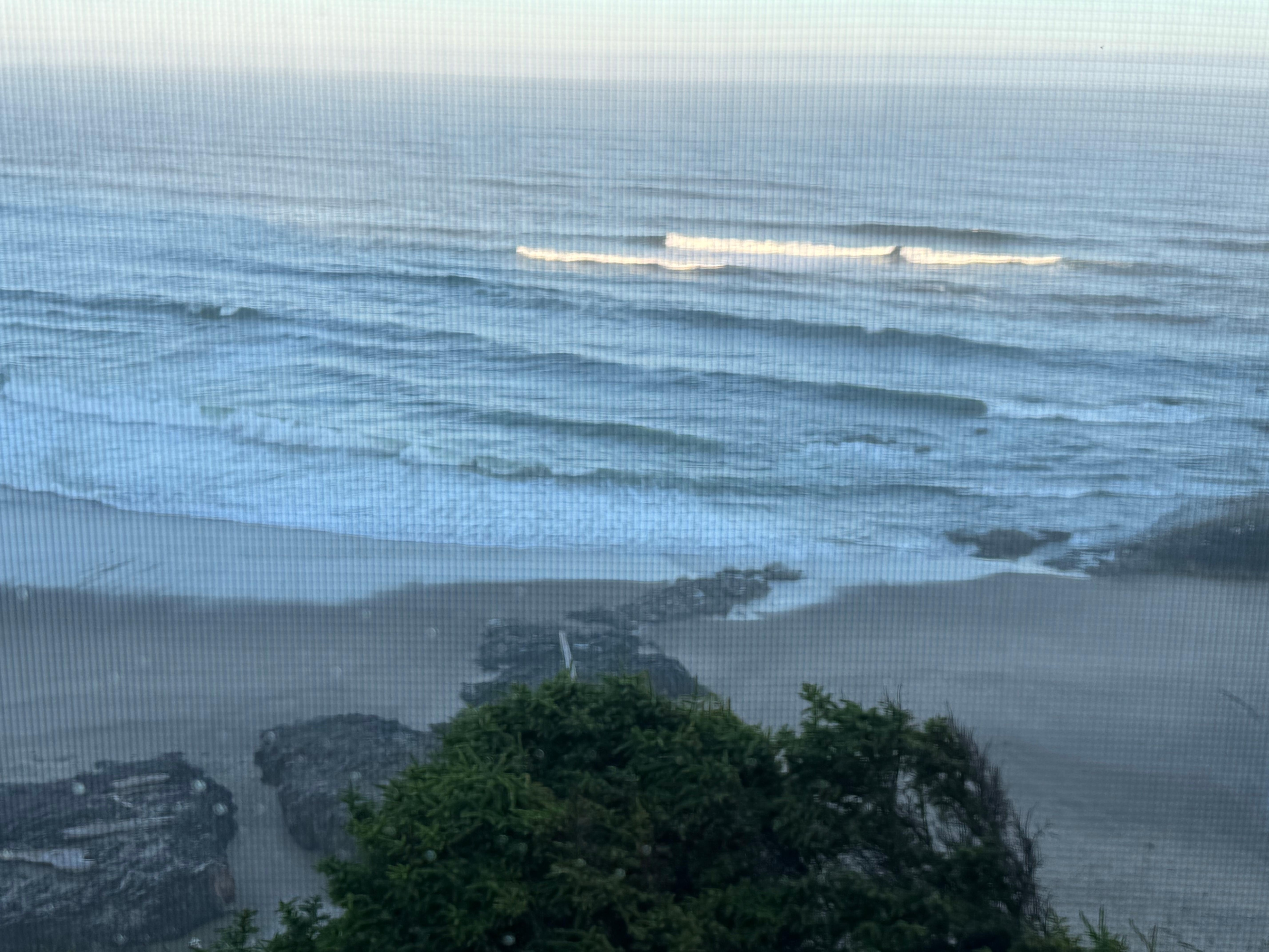 Our view of the beach and ocean from the window in our room.