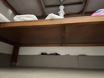 Second room where we ended up staying and black mold under the vanity