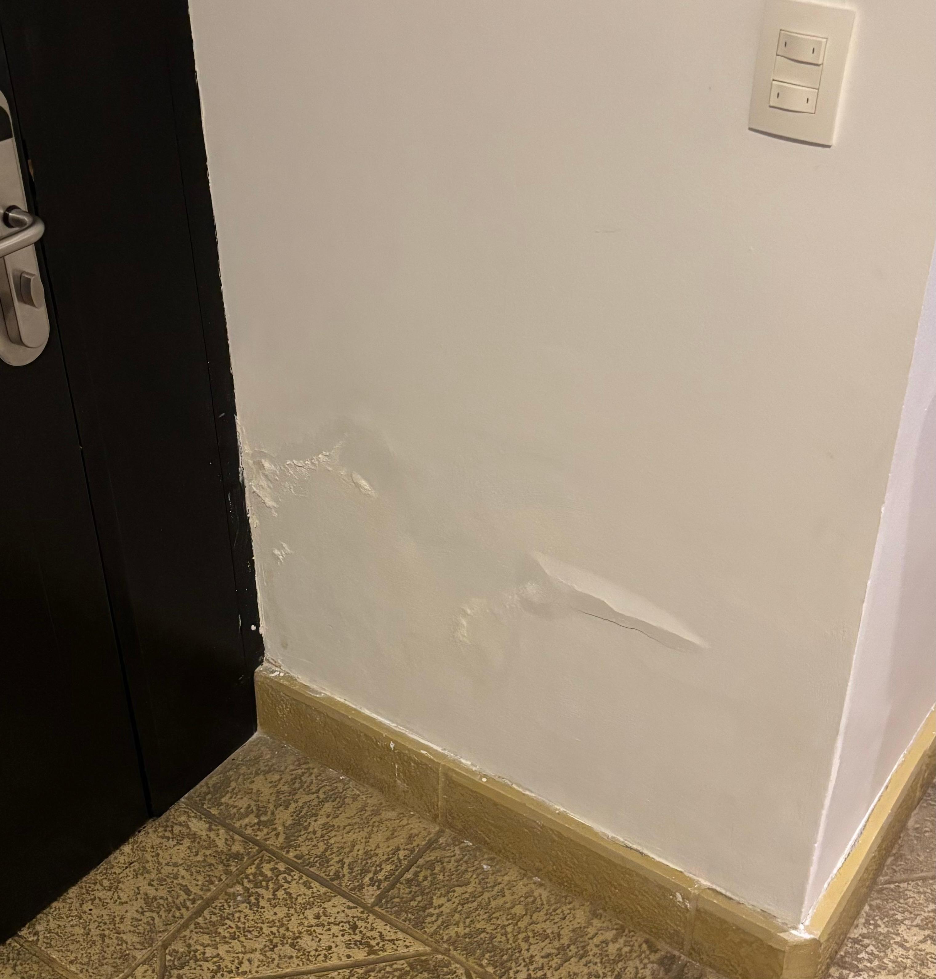 Pipe leaking behind the wall upon entry