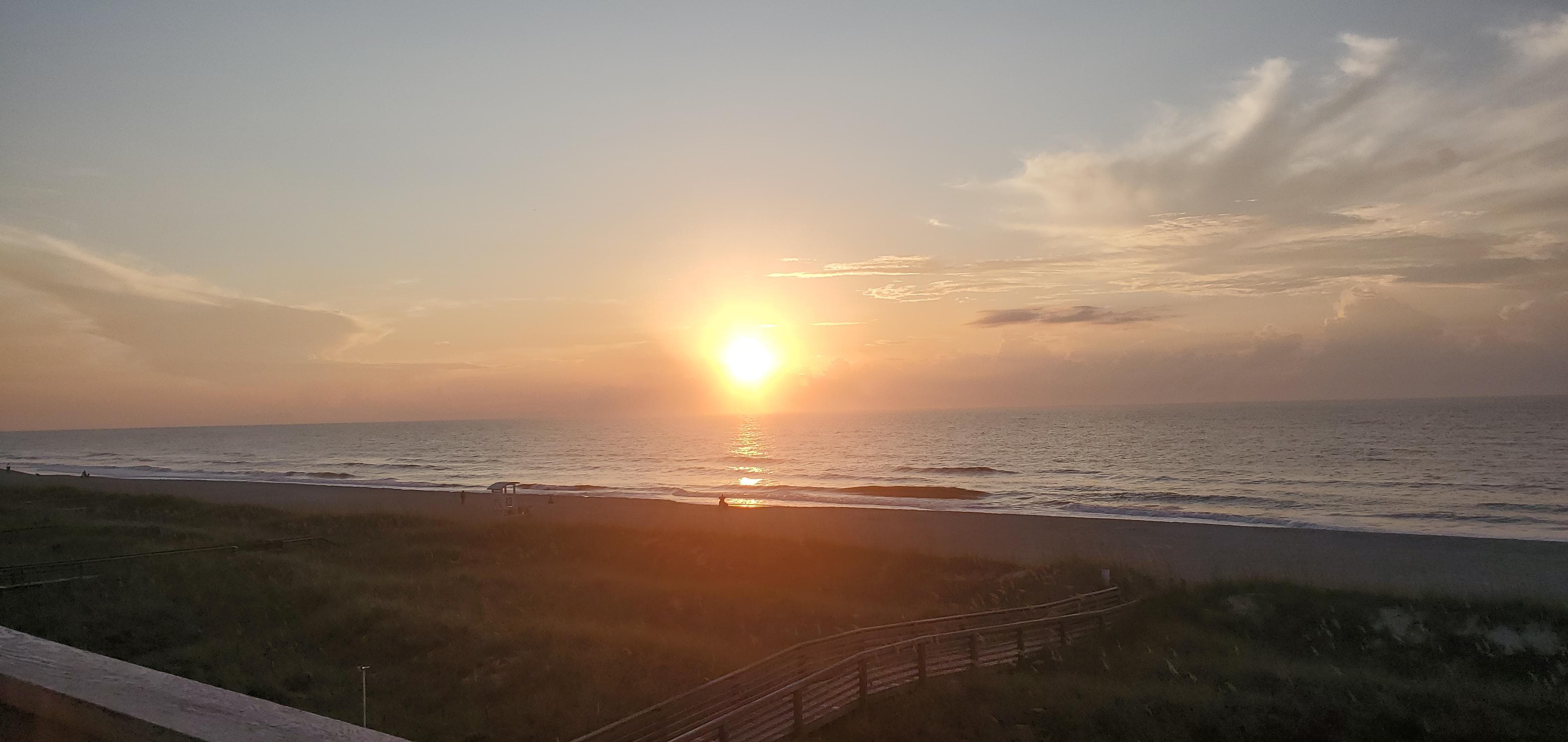 Sunrise on the balcony each morning and moonlight on the ocean each night. 