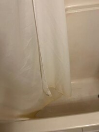 Dirty tub/shower curtain