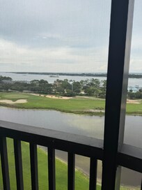 We watched our husbands play hole 17 & 18.