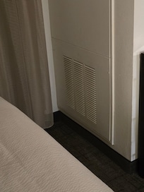 AC exhaust vent at foot of bed , Very noisy compressor