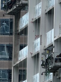 This is the side of the building this property is located on. As you can see it’s an active construction site!