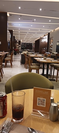 Sitting in Kitchen& Bar area looking towards lobby.