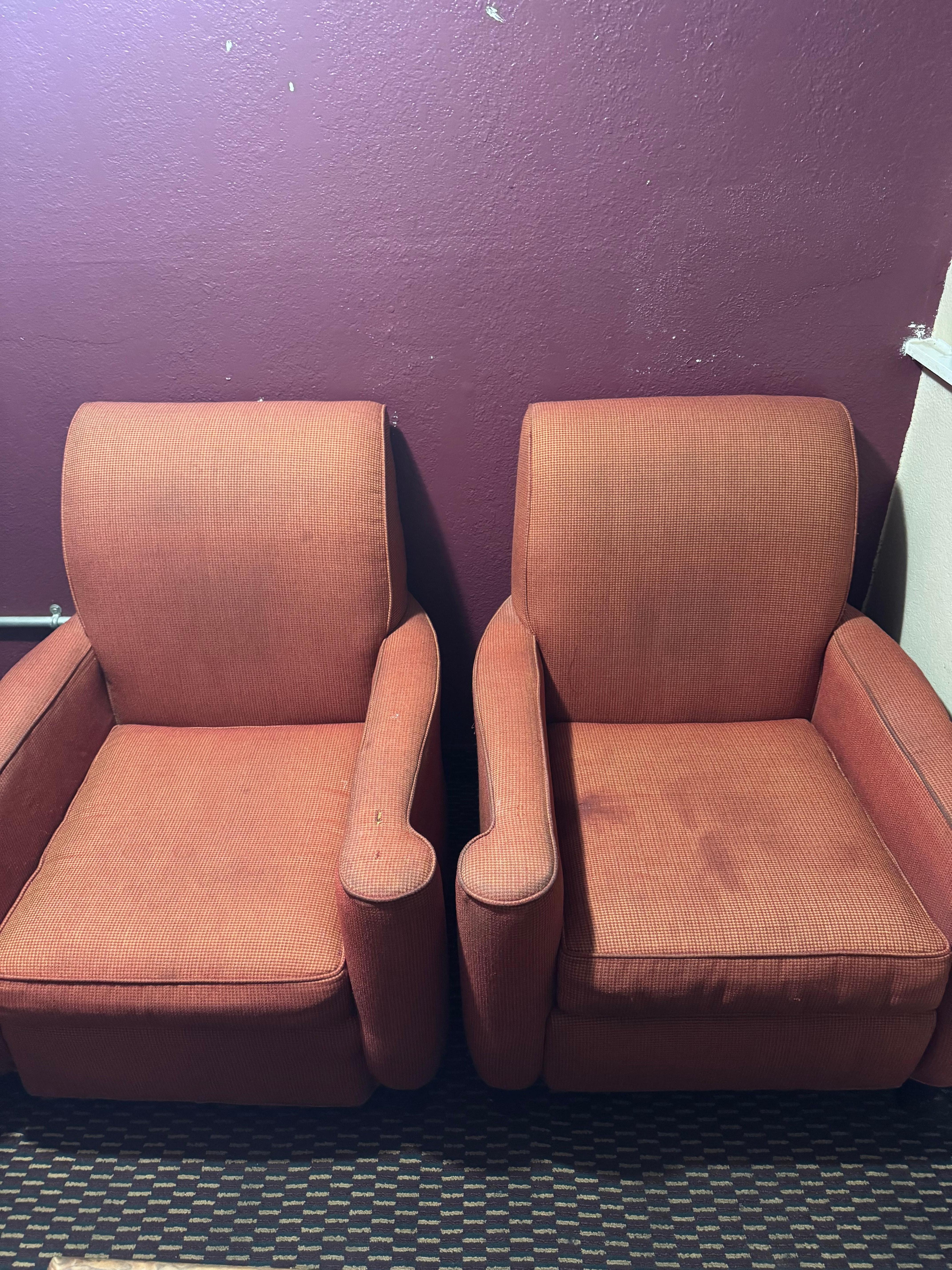 Burnt and stained chairs. Along with greasy stained walls. 