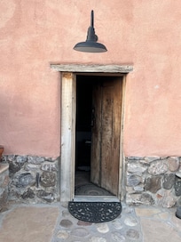 the entrance to the adobe casita
