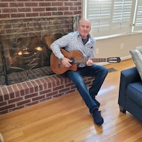 Enjoying the spacious living area and the fireplace.