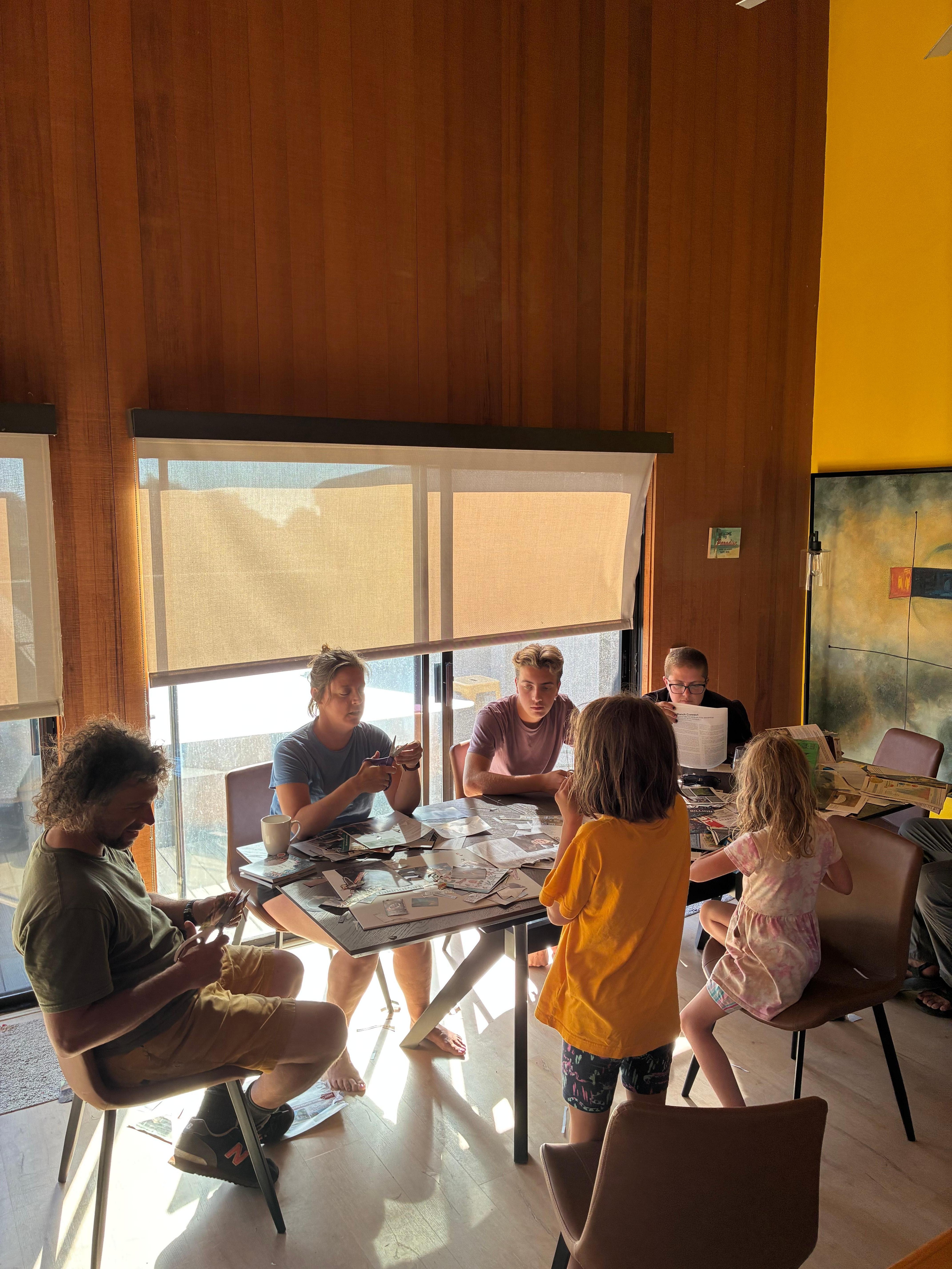 Big dining room table suitable for family art collage project to commemorate our reunion.