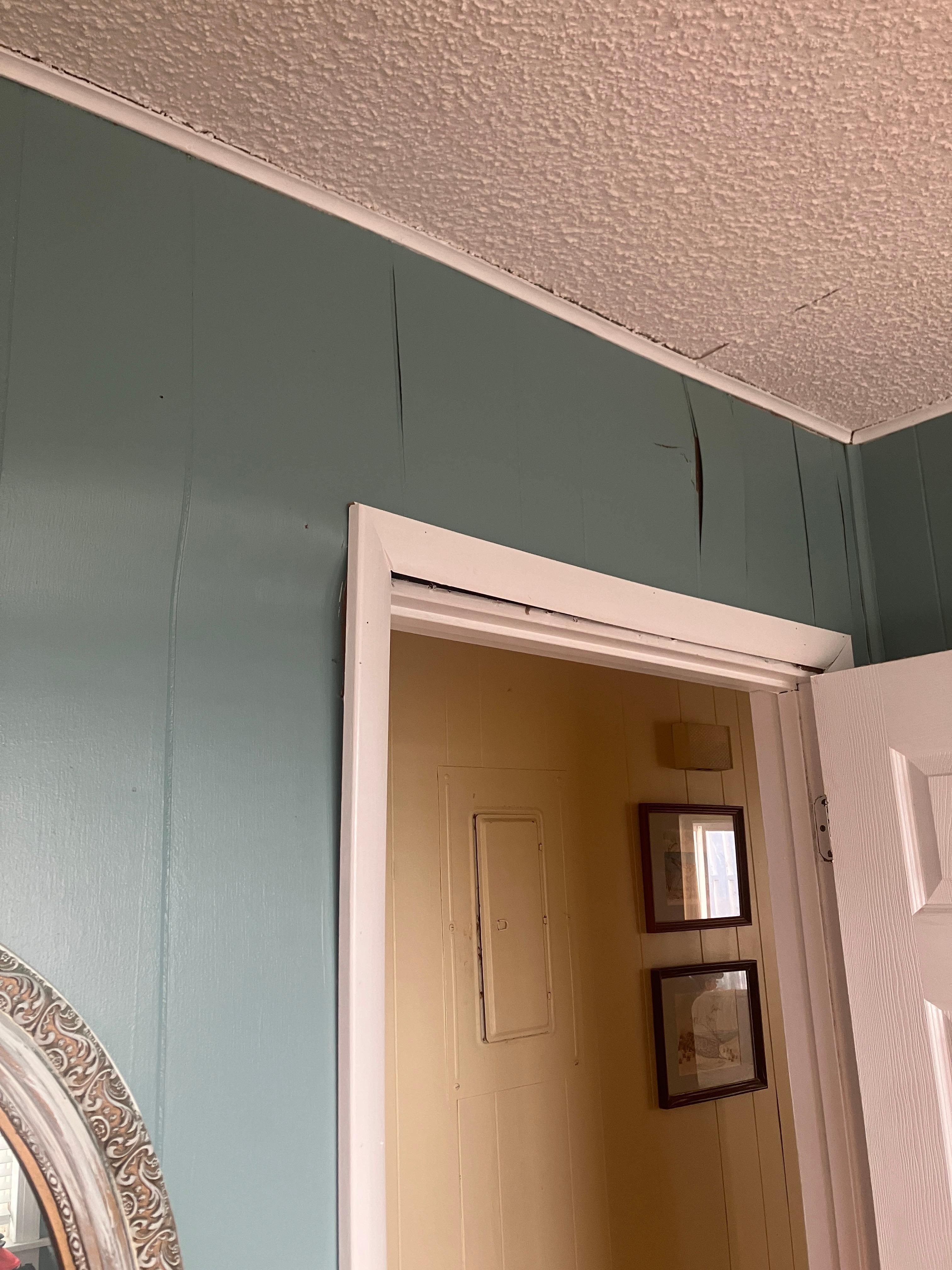 Door frame showing general disrepair of the house.