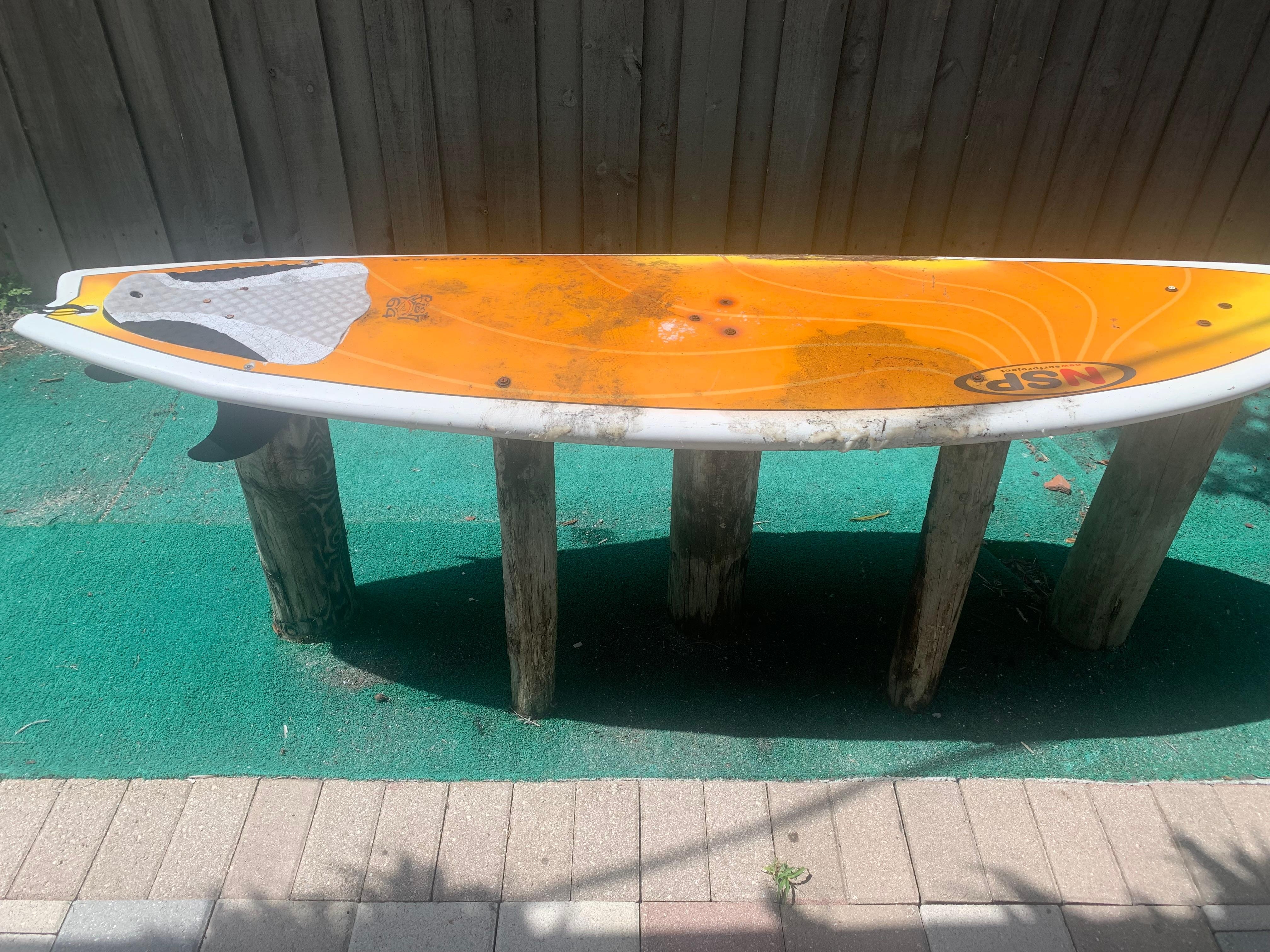 Table by pool no chairs & filthy 