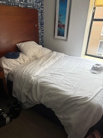 This is how the bed was made by the housekeeper. We left in the morning and found it like this in the evening. Terrible job.