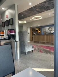 Check-in area and essentials market.