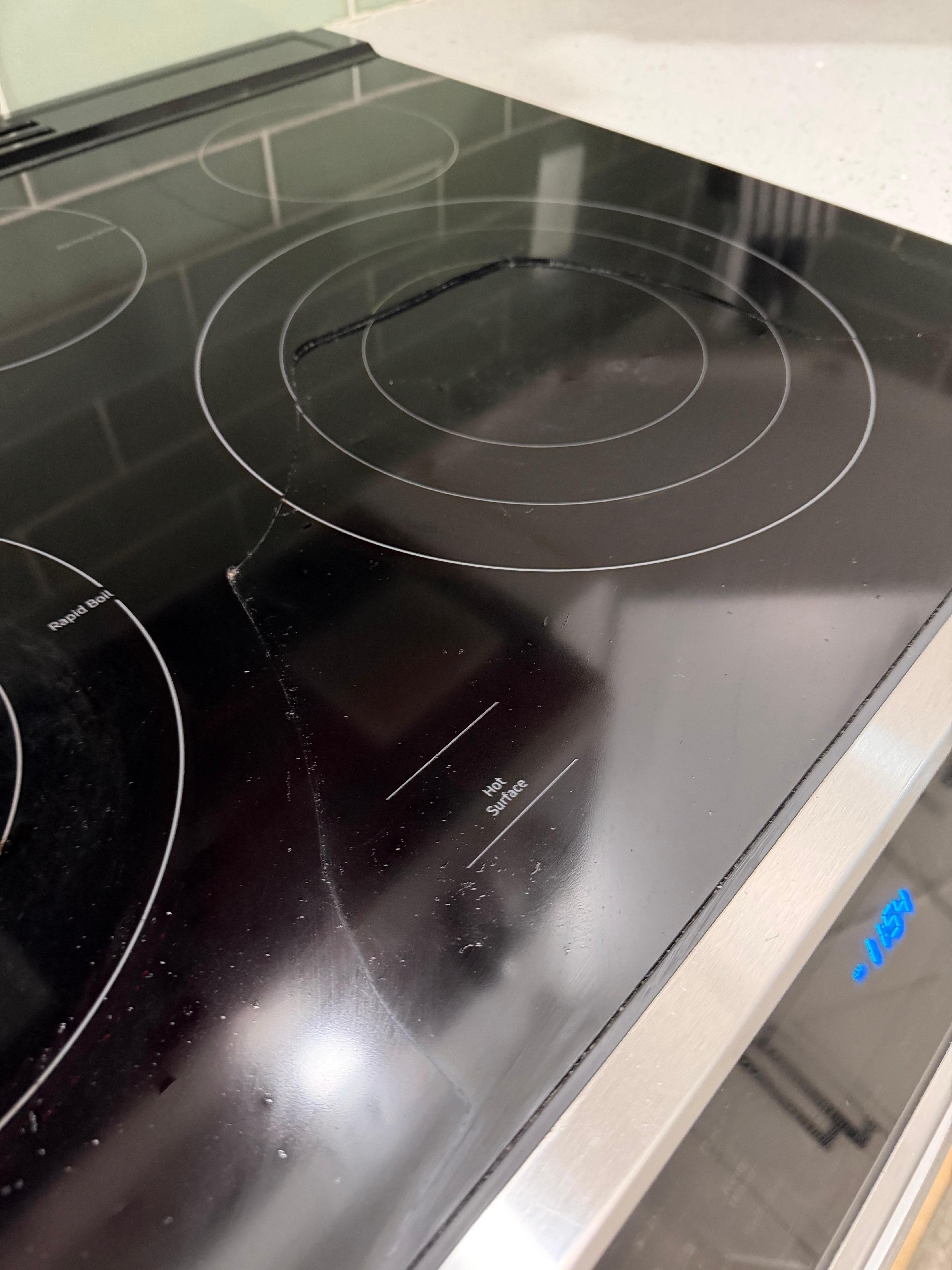 range top cracked upon arrival, notified owners.