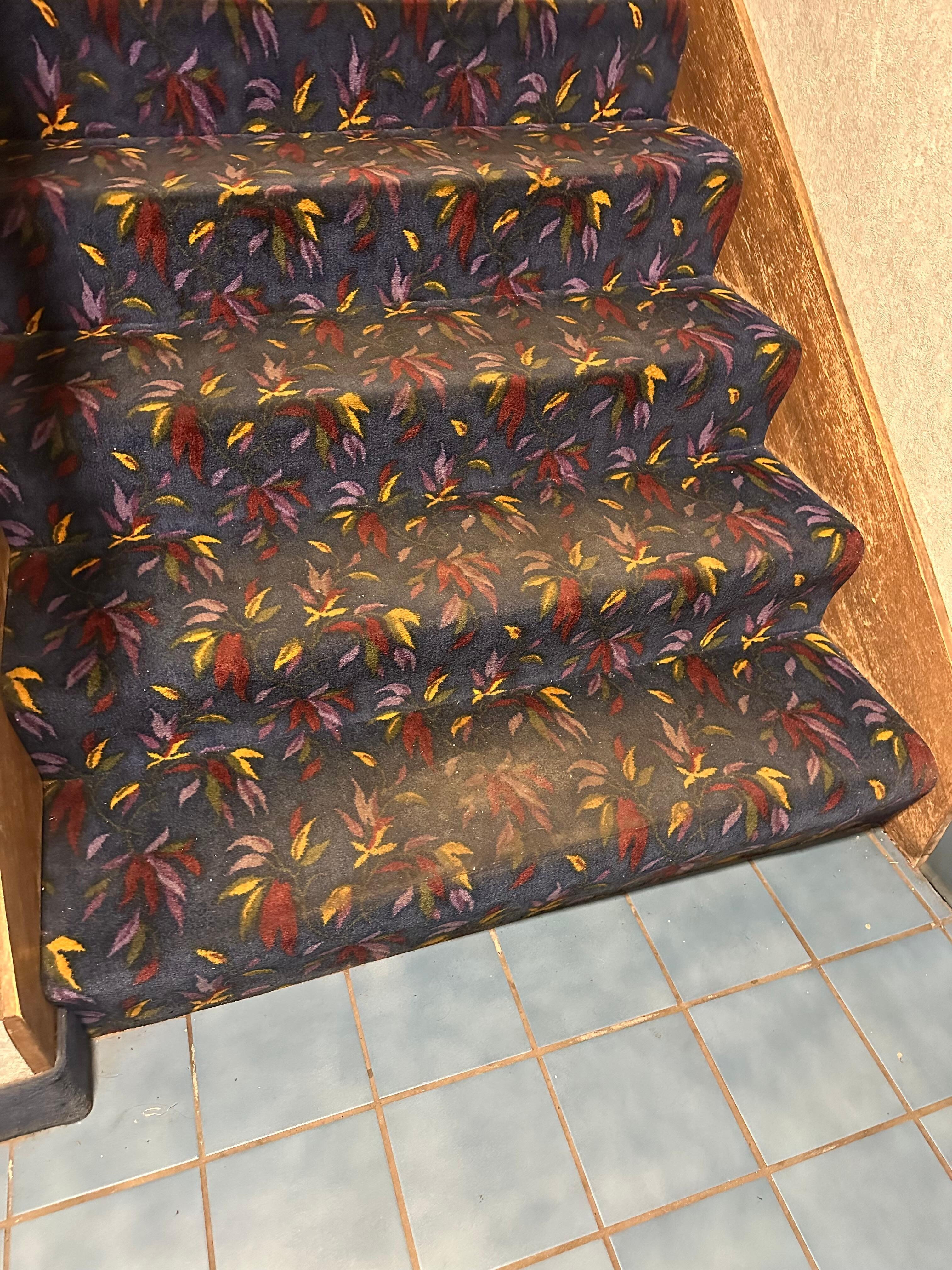 Extremely dirty stairs. Not faded but literally dirty and unswept dirt sitting on top.