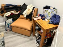 Corner of bedroom. We found small table stuff clothes in.